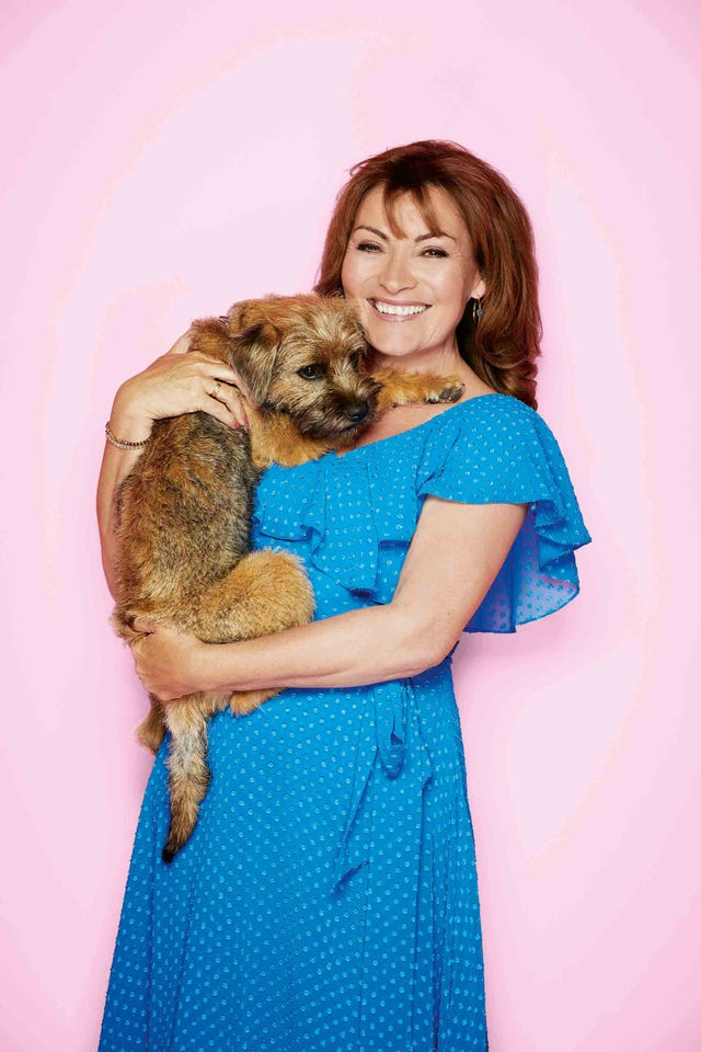 tv presenter lorraine kelly with her border terrier dog angus