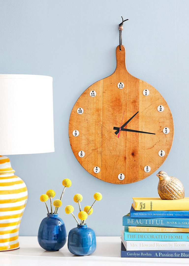 A round cutting board made from a clock