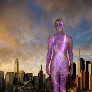 cyberspace woman standing near city skyline