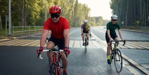 cycling club on road at countryside, 8 week 50 mile training plan