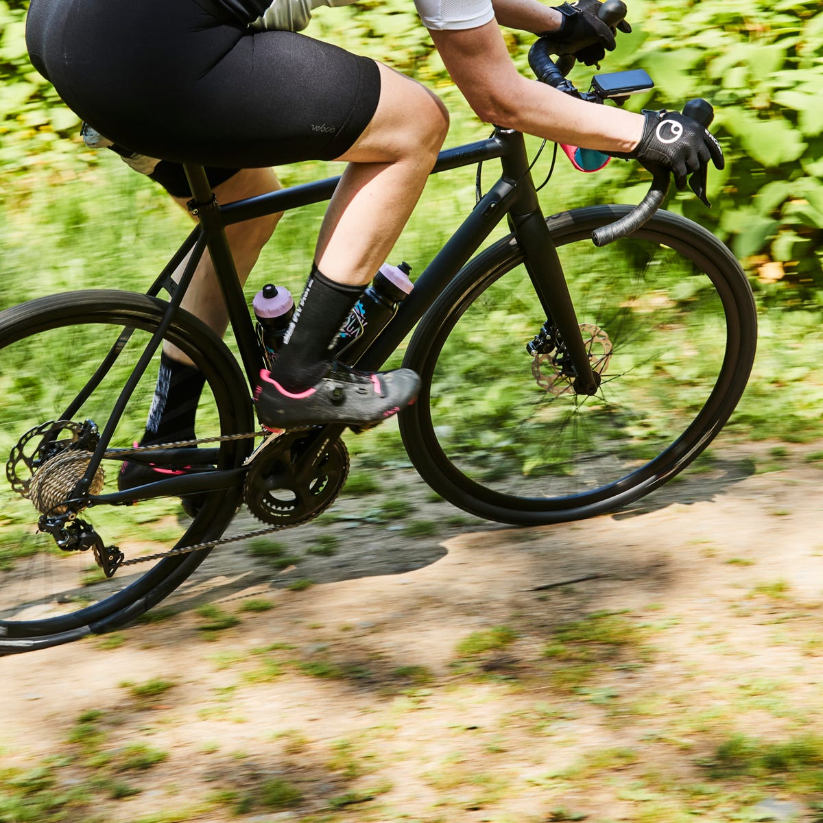 tara seplavy riding the black heart allroad bicycle in shorts