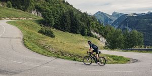 cyclist on hairpin bend on col de corbier