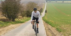 cyclist on road in countryside