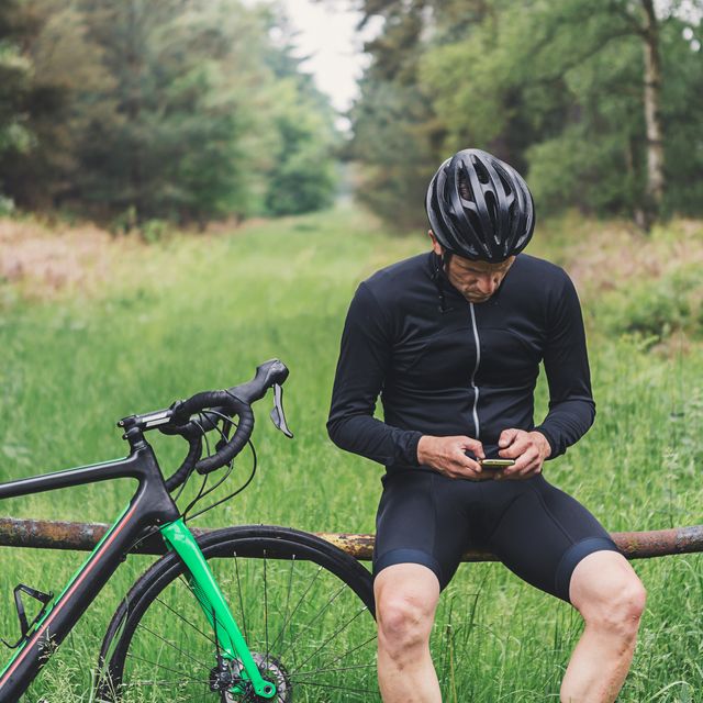Cyclist using smartphone