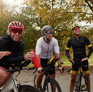 cyclists relaxing on roadside