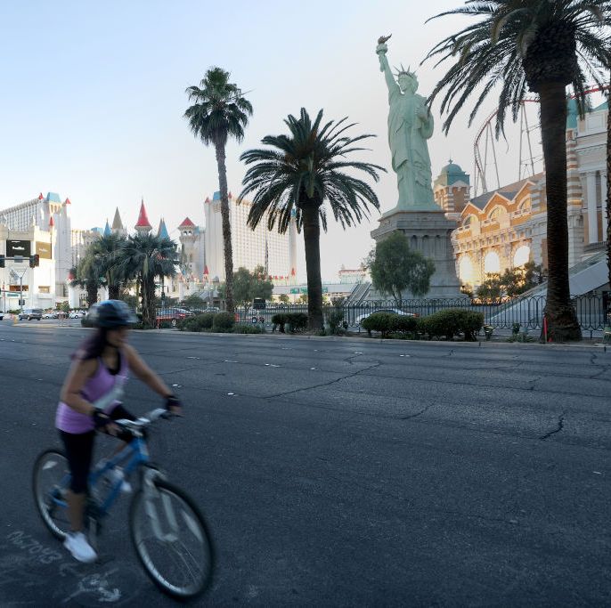 a woman riding a bike in las vegas
