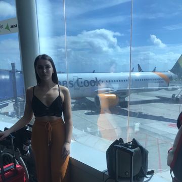 'Cover Up Or Leave The Plane': British Woman Left 'Shaking' After Wearing Crop Top On Flight