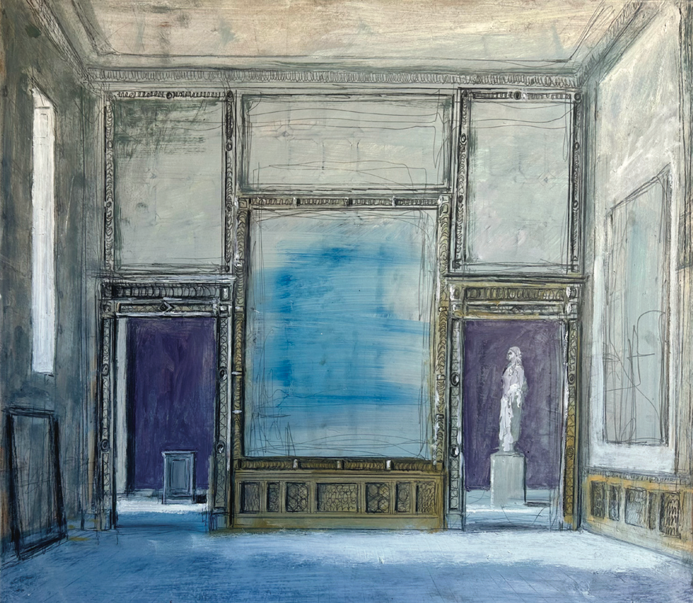 Interior of a gallery with a large blue wall and a statue in the background.