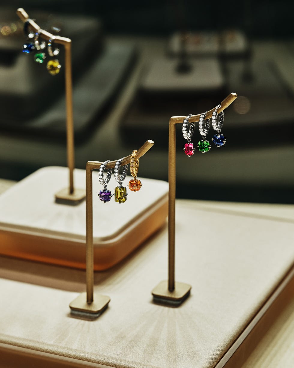 Display of colorful earrings on stands