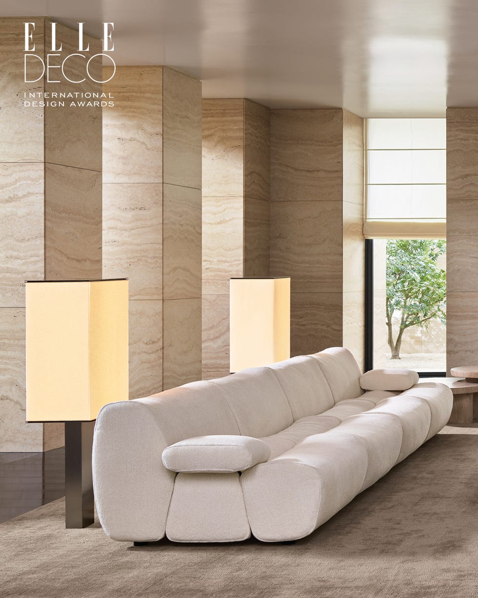 Contemporary lounge area with a modern sofa and lamps. Contemporary lounge area with a modern sofa and lamps.