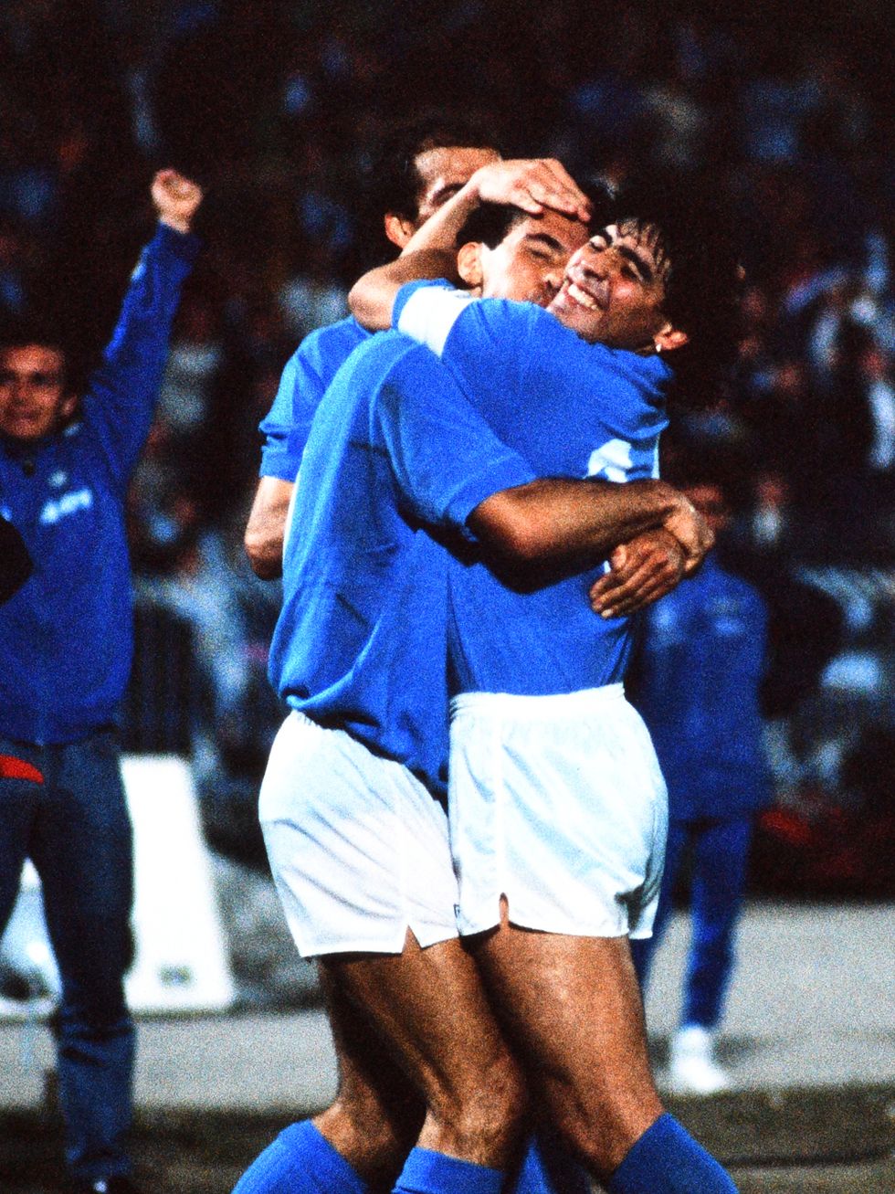 naples, italy   april 05 diego maradona and careca of napoli celebrate during the uefa cup semi final first leg between napoli and bayern munich at the stadio sao paulo on april 5, 1989 in naples, italy photo by etsuo haragetty images