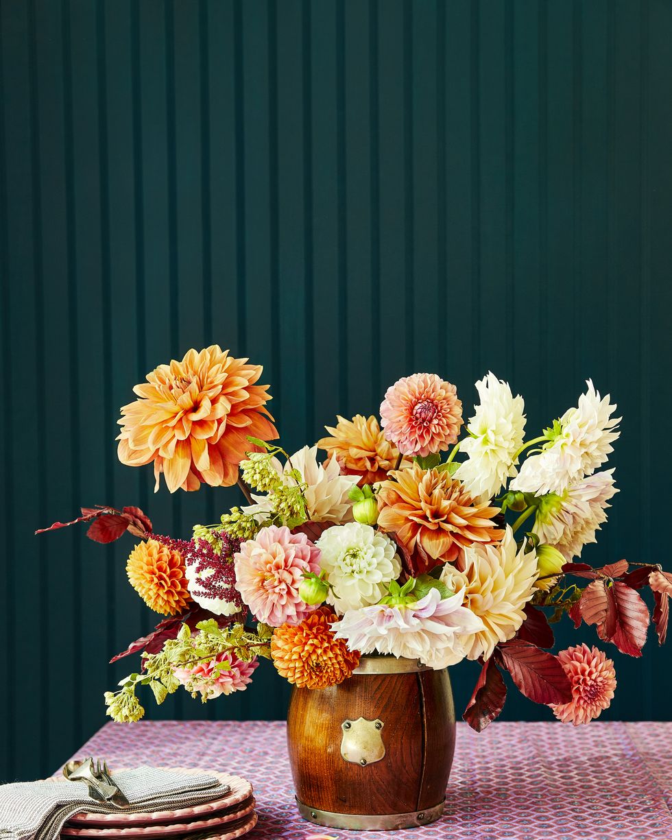 table with vase of dahlia flowers