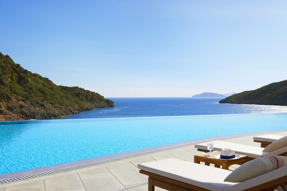 Property, Resort, Vacation, Sea, Azure, Bay, Swimming pool, Room, Coast, Coastal and oceanic landforms, 