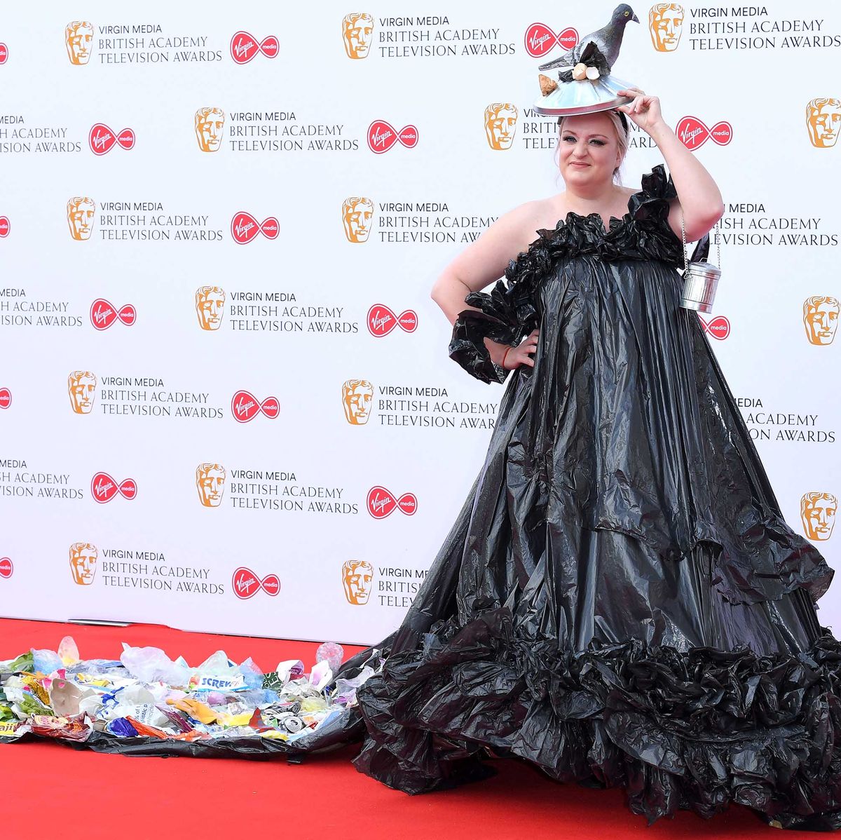 An actress wearing a dress made out of garbage bags, Academy