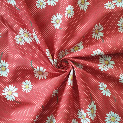 red dotted daisy print fabric
