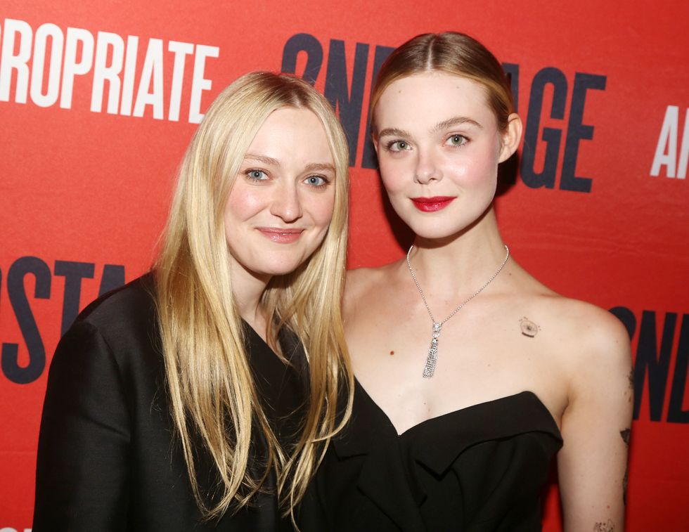 dakota fanning and elle fanning smiling and embracing for a photo