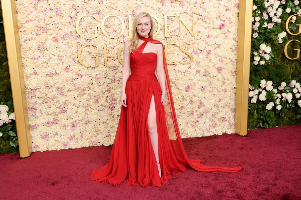 Dakota Fanning Wears a Red Gown With Thigh-High Slit on the 2025 Golden Globes Red Carpet