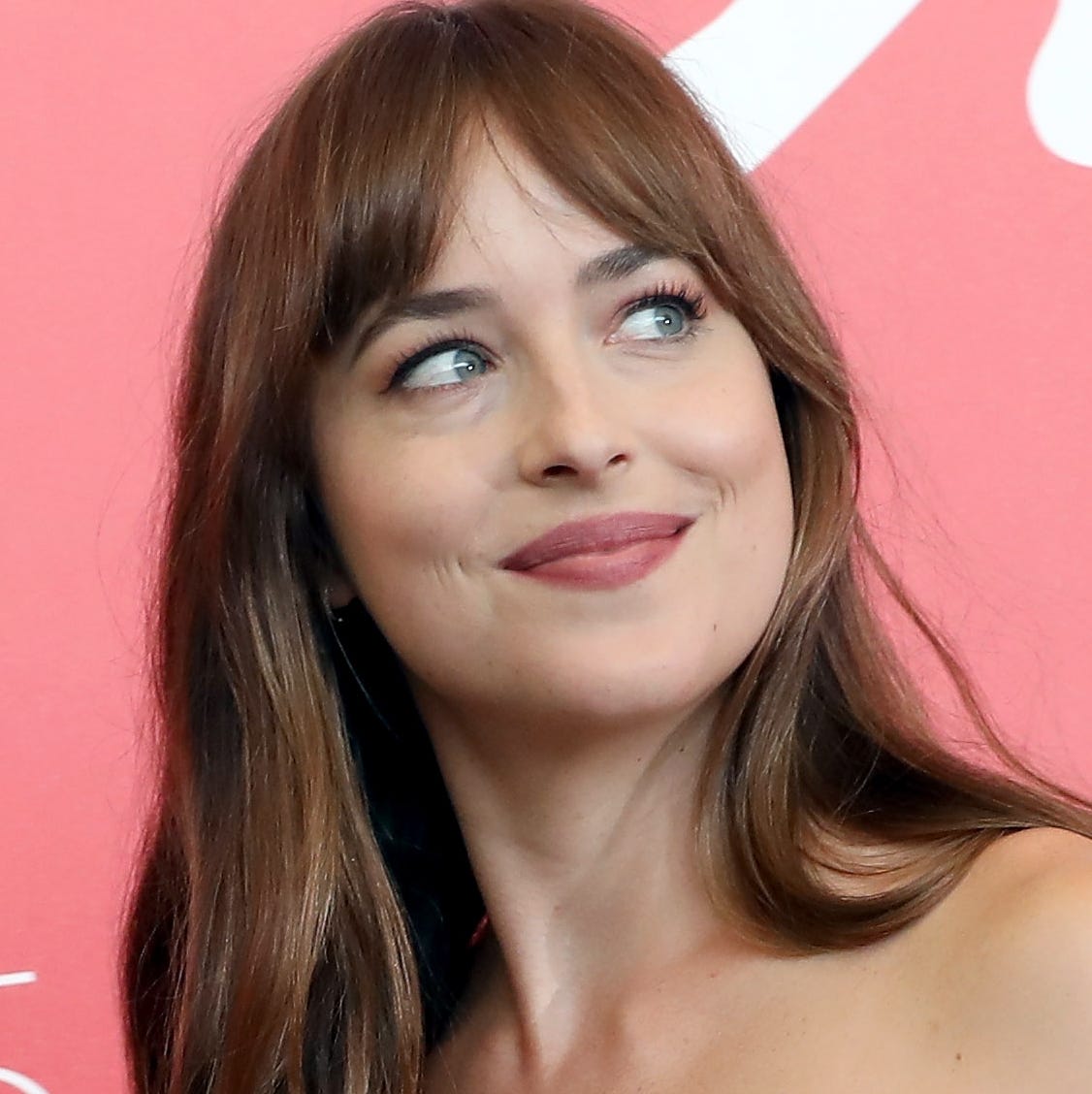 Dakota Johnson Wore a Super Low-Cut Nude Dress That Made Everyone Stop and Stare