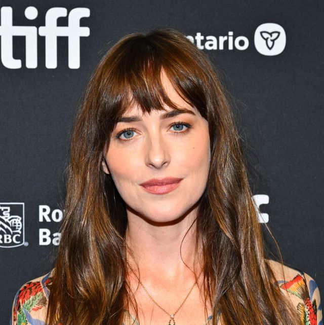 Here's Why Dakota Johnson Is Wearing a Bloody Heart Dress at the