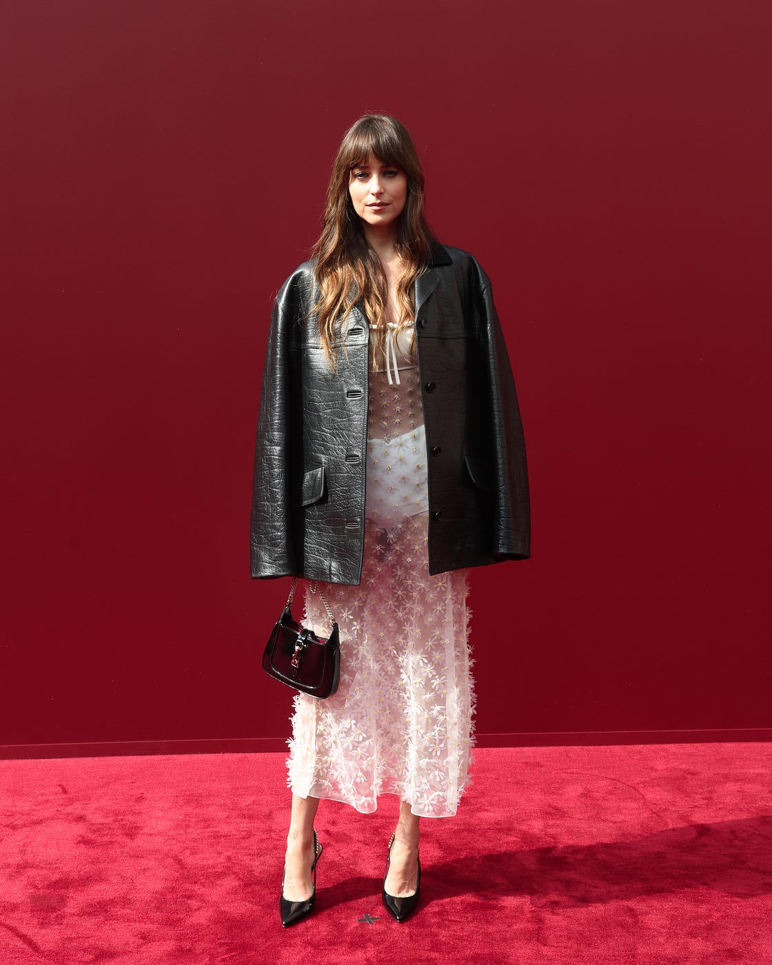 dakota johnson in a leather jacket