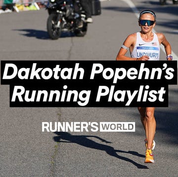 athlete running on a road with a crowd in the background athlete running on a road with a crowd in the background