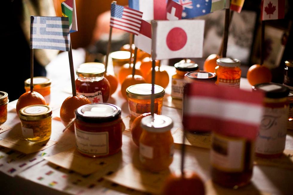 a group of jars with a flag on top