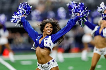 a dallas cowboys cheerleader performs during the game between the dallas cowboys and the new orleans saints on september 15, 2024