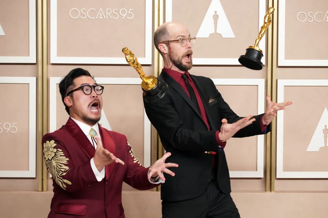 daniel kwan and daniel scheinert pose with their oscars in the press room at the 95th annual academy awards at ovation hollywood on march 12, 2023 in hollywood, california