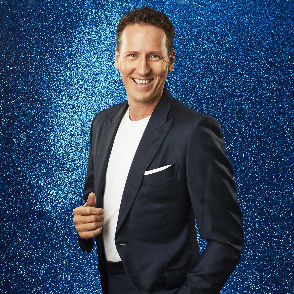 brendan cole smiles in his official dancing on ice 2022 cast portrait