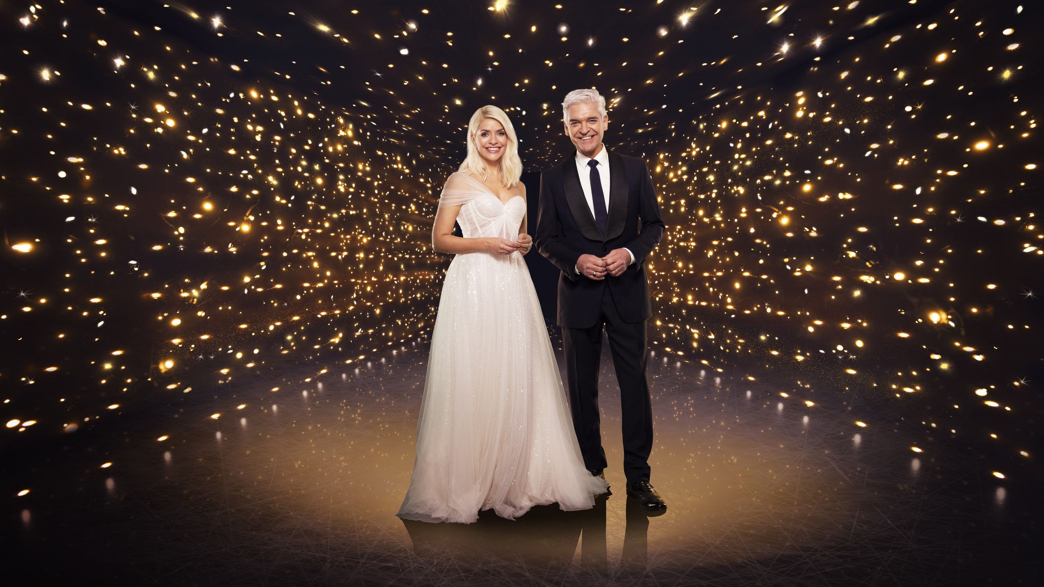 this image and the information contained herein is strictly embargoed until 0001 tuesday 12th january 2021from itv studiosdancing on ice sr13 on itvpictured holly willoughby and phillip schofieldthis photograph is c itv plc and can only be reproduced for editorial purposes directly in connection with the programme or event mentioned above, or itv plc once made available by itv plc picture desk, this photograph can be reproduced once only up until the transmission tx date and no reproduction fee will be charged any subsequent usage may incur a fee this photograph must not be manipulated excluding basic cropping in a manner which alters the visual appearance of the person photographed deemed detrimental or inappropriate by itv plc picture desk  this photograph must not be syndicated to any other company, publication or website, or permanently archived, without the express written permission of itv picture desk full terms and conditions are available on the website wwwitvcompresscentreitvpicturestermsfor further information please contactjameshilderitvcom  0207 157 3052