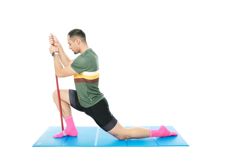 a woman stretching on a mat