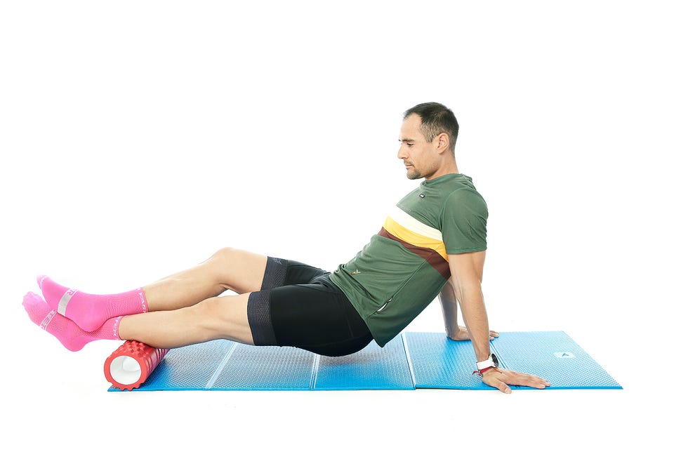 a person stretching on a mat