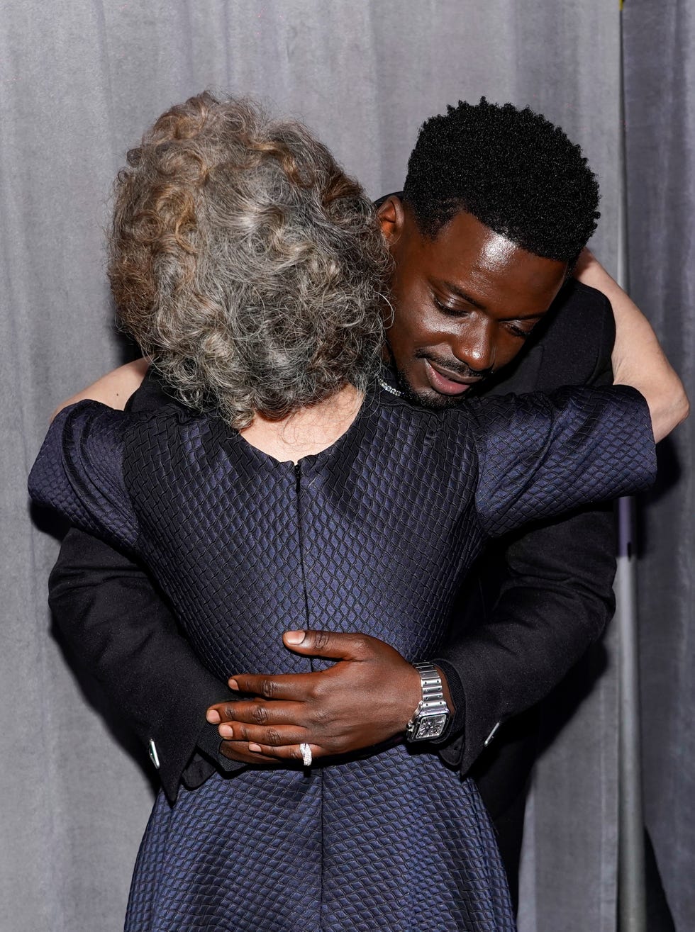 los angeles, california   april 25 l r yuh jung youn, winner of best actress in a supporting role for minari, and daniel kaluuya, winner of best actor in a supporting role for judas and the black messiah, pose outside the press room at the oscars on sunday, april 25, 2021, at union station in los angeles photo by chris pizzello poolgetty images