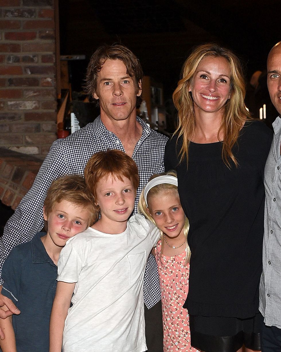 kelly slater, john moore and friends celebrate the launch of outerknown