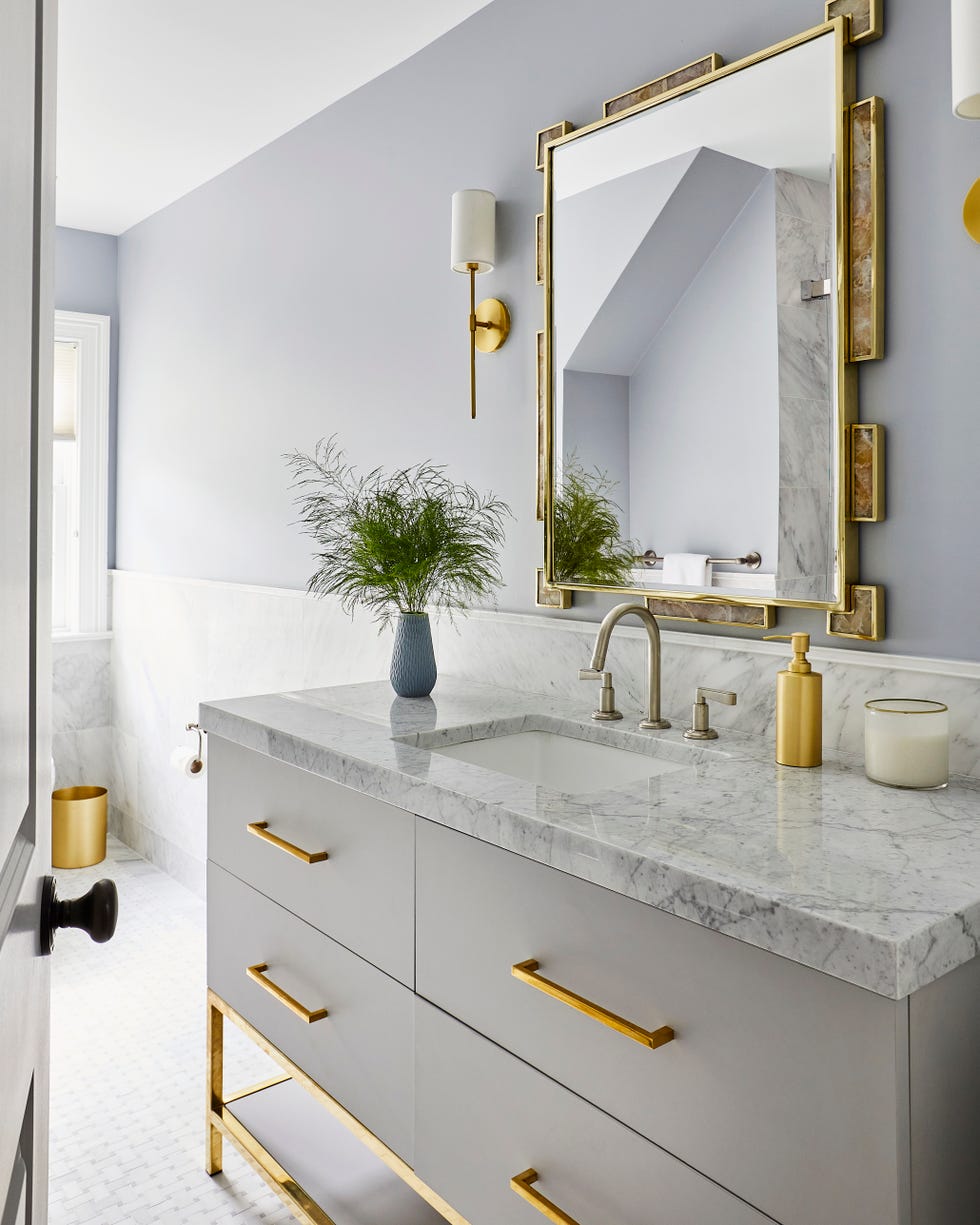bathroom decor with gold accents