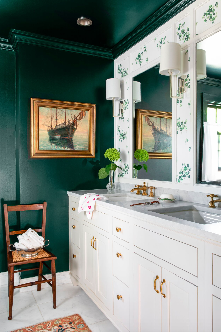 a bathroom with a mirror and sink