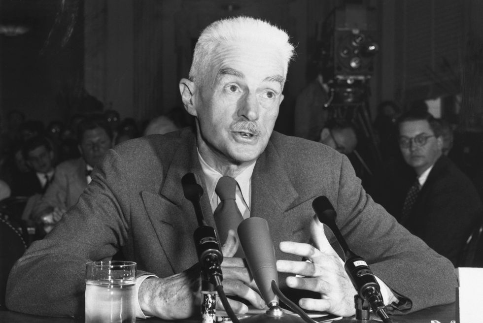 dashiell hammett speaking into microphone