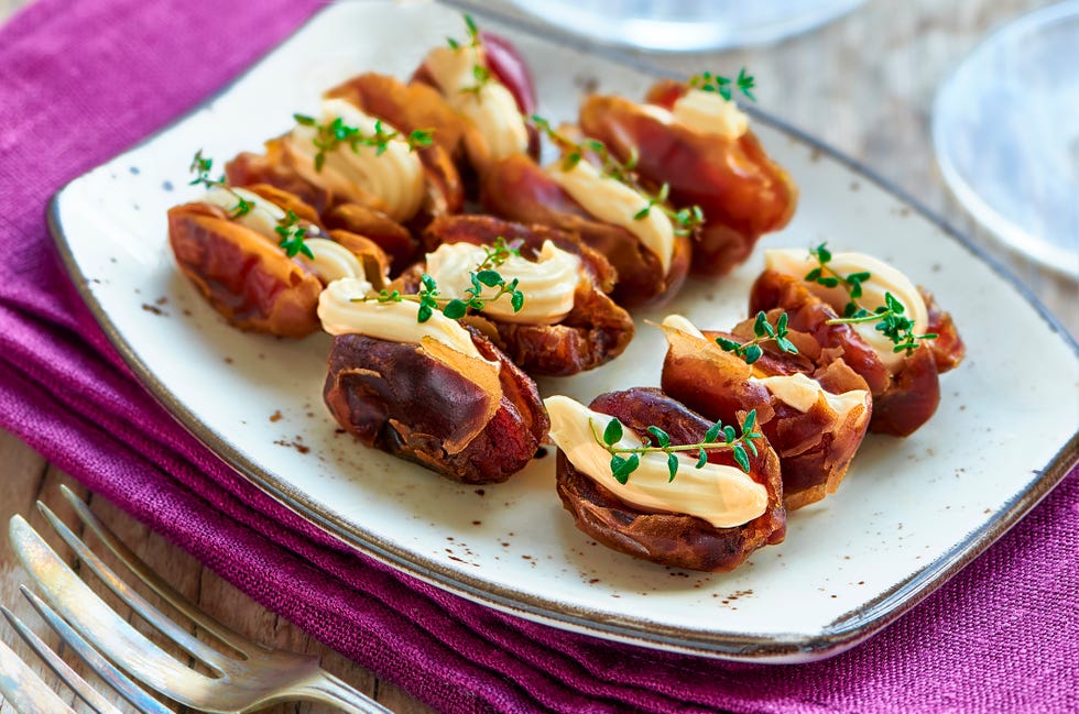 dates stuffed with processed cheese and thyme