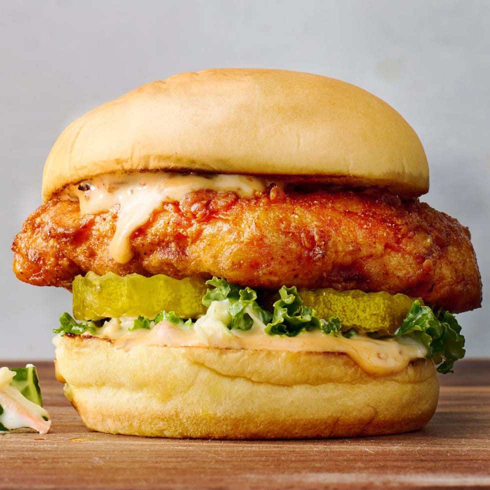 hot cauliflower on a bun with sauce, slaw, and pickles
