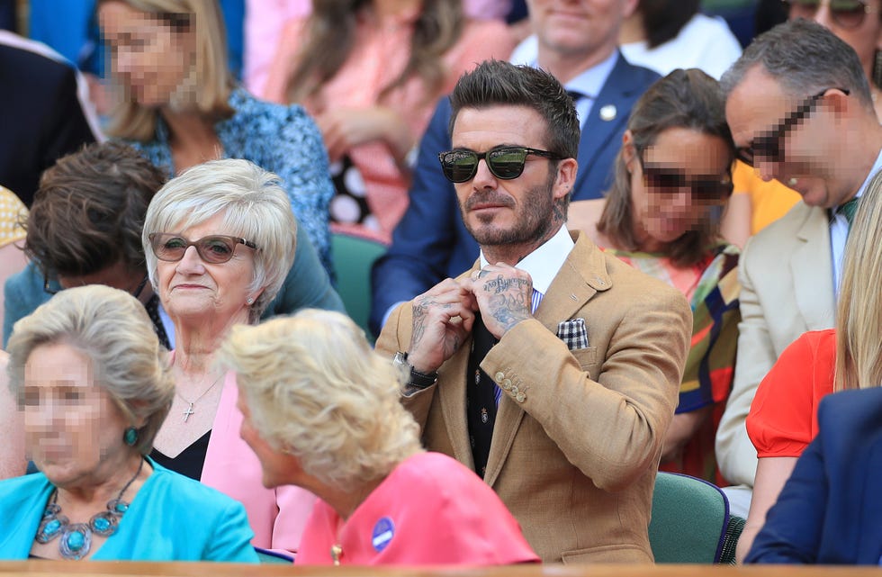 David Beckham y su madre en el tenis