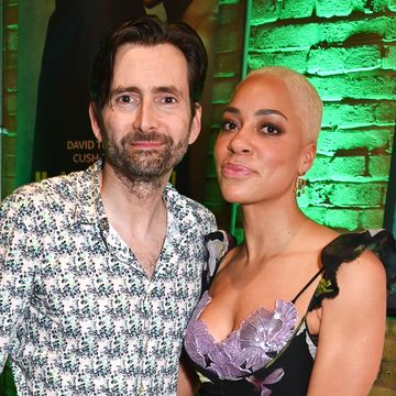 david tennant and cush jumbo hug each other and smile as they pose for a photograph