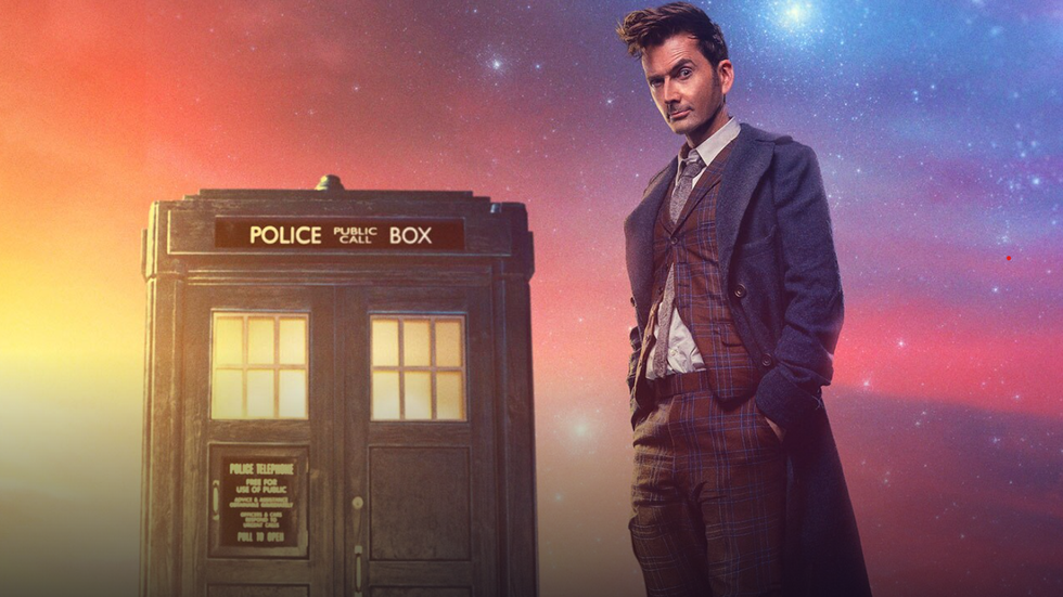 david tennant as the fourteenth doctor in doctor who, standing in front of the tardis with a brightly coloured backdrop