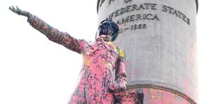 a statue of jefferson davis, the president of the confederate states of america during the civil war, is shown defaced with paint from ongoing anti racism protests june 10, 2020 in richmond, virginia later in the evening of june 10, protesters torn the statue down
