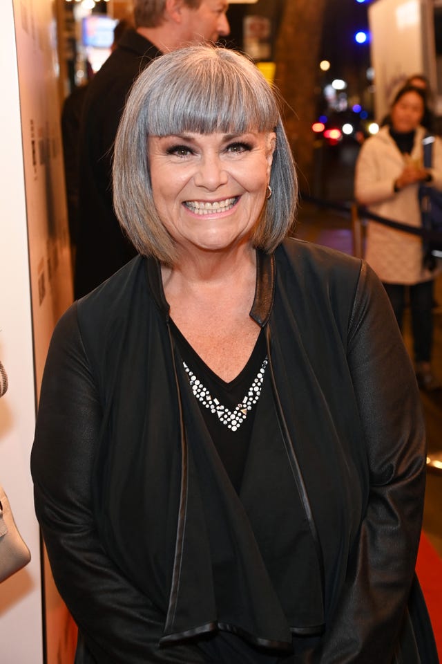 Dawn French looks sensational in colourful, reclaimed dress