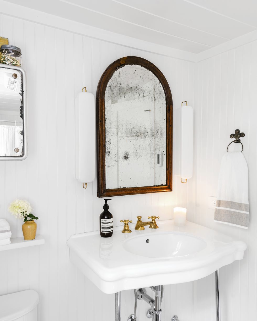 white farmhouse bathroom with vgroove paneling