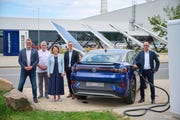 the high power charging park with new automotive powerbank in the background is open from left florian köhler, project manager aw automotive, ingolf keller, energy officer, karen kutzner, managing director finance and controlling vw saxony, lars thielemann, head of planning and jörg engelmann, head of innovation