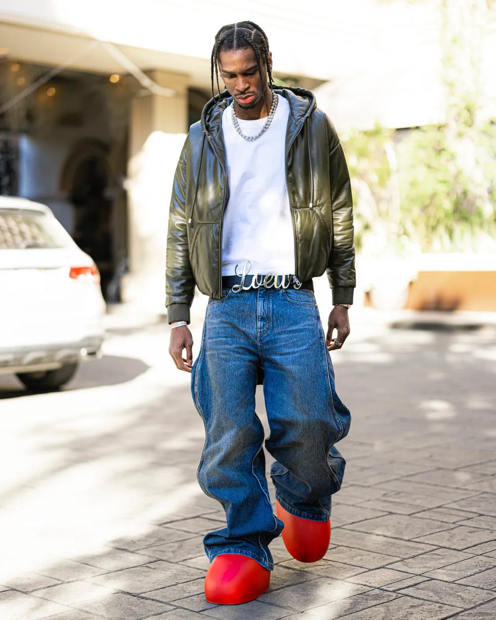 person walking in streetwear fashion showcasing a bold outfit choice