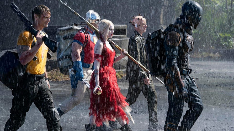 peacemaker, harley quinn, the thinker and bloodsport walking in the suicide squad, the 10th movie in the dc movies in order
