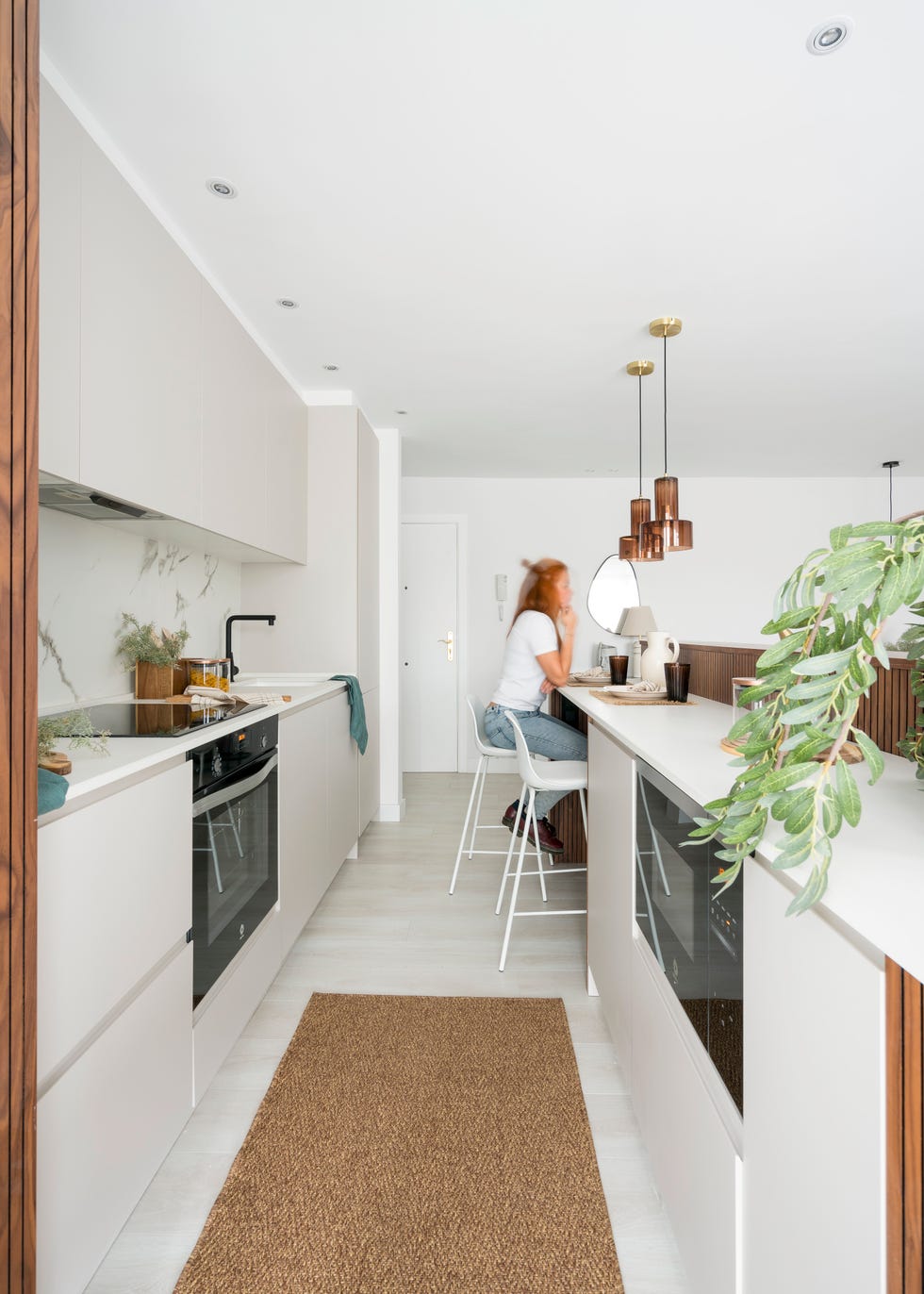 una transformacion sorprendente, de espacios oscuros a una vivienda luminosa y funcional en bilbao