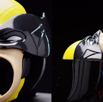 a cartoon of a person wearing a yellow and black helmet and goggles